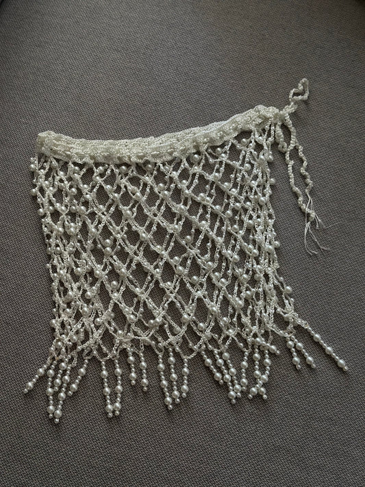 Faldita crochet perlas